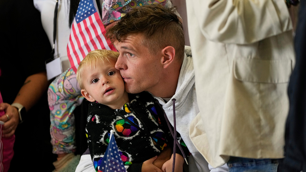 Afrikaner refugees from South Africa arrive, Monday, May 12, 2025, at Dulles International Airport in Dulles, Va.