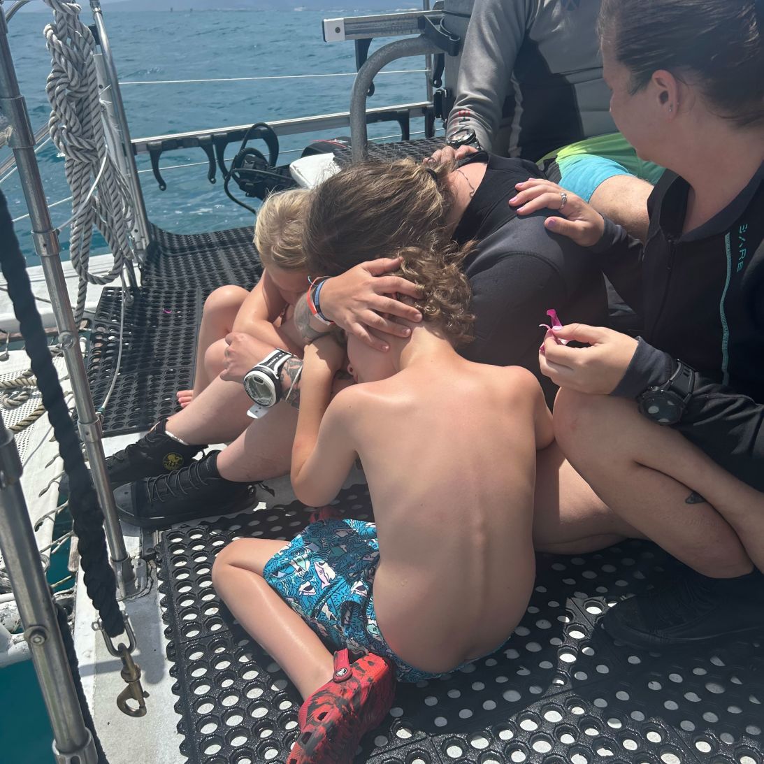 Ashley Bugge and her children on the anniversary of her husband