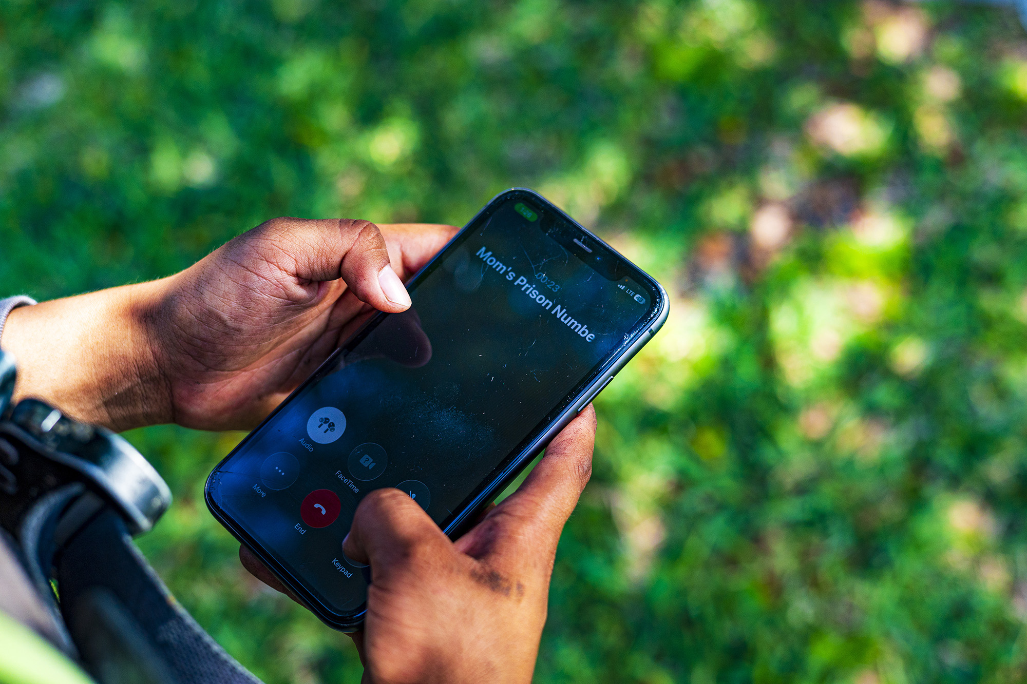 A person holding a phone that is making a phone call.