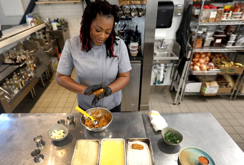 Tiffany Derry makes suppli, a rice croquette, at Roots Southern Table in Farmers Branch, 2023.
