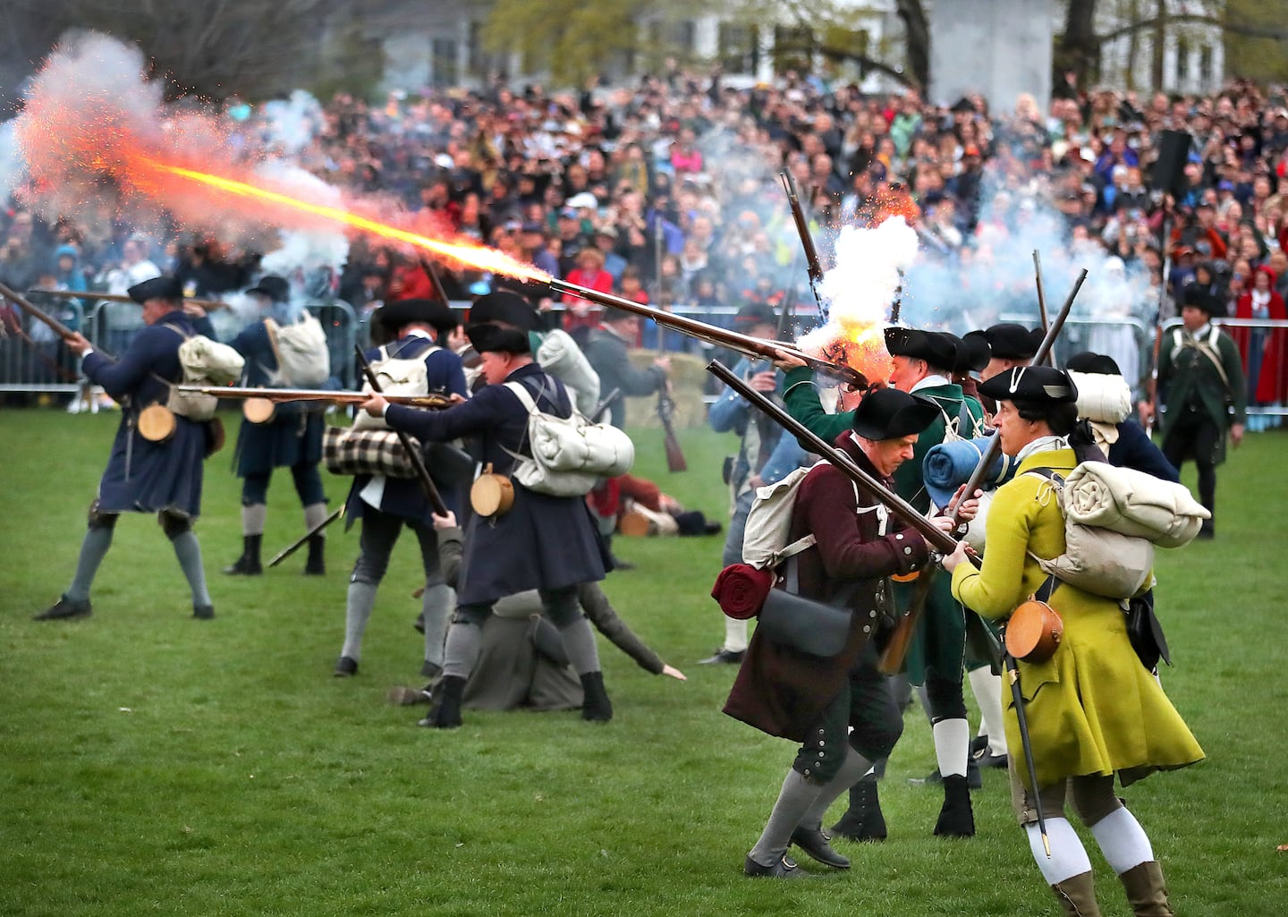 Colonial militia fired back at the advancing British troops on Lexington Battle Green during the reenactment of the first battle of the American Revolution held April 19.