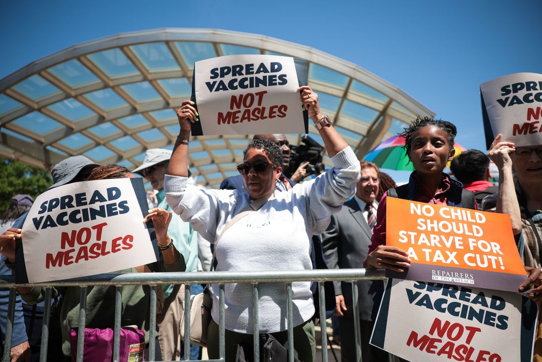 Demonstrators rally against the Trump administration