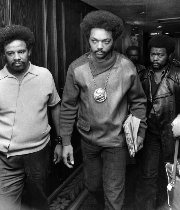 The Rev. Jesse Jackson, center, leaves a meeting with Southern Christian Leadership Conference leader Ralph Abernathy on Dec. 3, 1971, at the Marriott Hotel in Chicago. Jackson would soon split from the civil rights group to form Operation PUSH. (Walter Kale/Chicago Tribune)