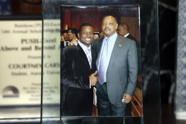 Courtney Carson, left, in a 2007 photo with the Rev. Jesse Jackson. (Terrence Antonio James/Chicago Tribune)