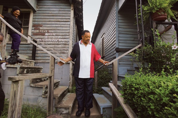 The Rev. Jesse Jackson pauses in July 2005 during a walk through the neighborhood in Greenville, S.C., where he grew up. (Terrence Antonio James/Chicago Tribune)