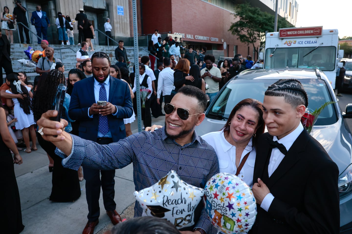  Eighth-grader Gabriel Fernando De Leon Ortiz stood for a selfie with his parents, Ferleon De Leon and Lesix Ortiz, following the Frederick's promotional ceremony at the Albert D. Holland High School of Technology in Boston on June 18.