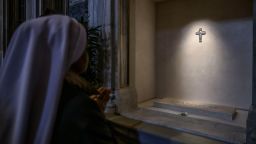 A nun prays in front of the tomb of Pope Francis on the first day of its opening to the public in Santa Maria Maggiore Basilica, on April 27, 2025 in Rome, Italy. Funeral rites for the late Pope Francis are held for nine days after his burial as he is mourned and celebrated by the faithful. During this time, the Vatican prepares for the process to elect a new Pope, known as the Conclave, which must begin within 15 to 20 days of the Pope