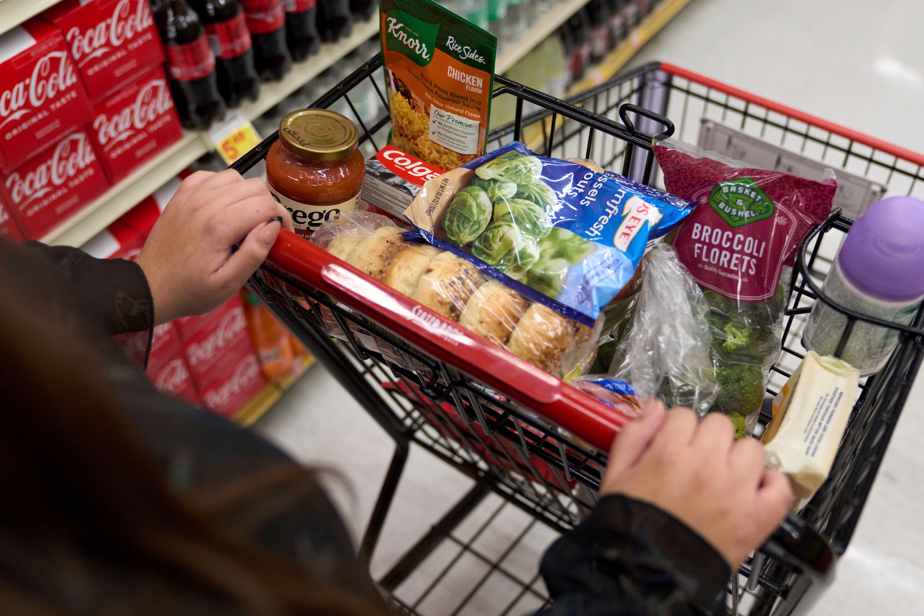 Jaqueline Benitez, who depends on California's SNAP benefits to help pay for food, shops for groceries at a supermarket in Bellflower, California, in 2023.