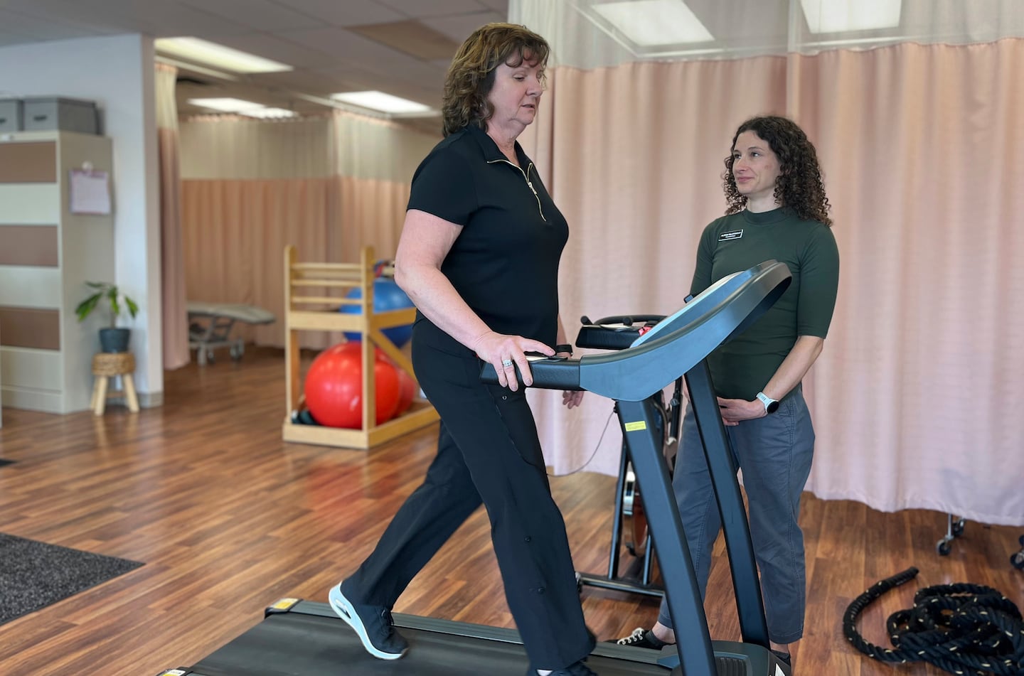 Terri Swain-Collins used a treadmill in the watchful eye of physiotherapist Alison MacDonald on May 20 at Kingston Injury Management, a clinic in Kingston, Ontario, in Canada.