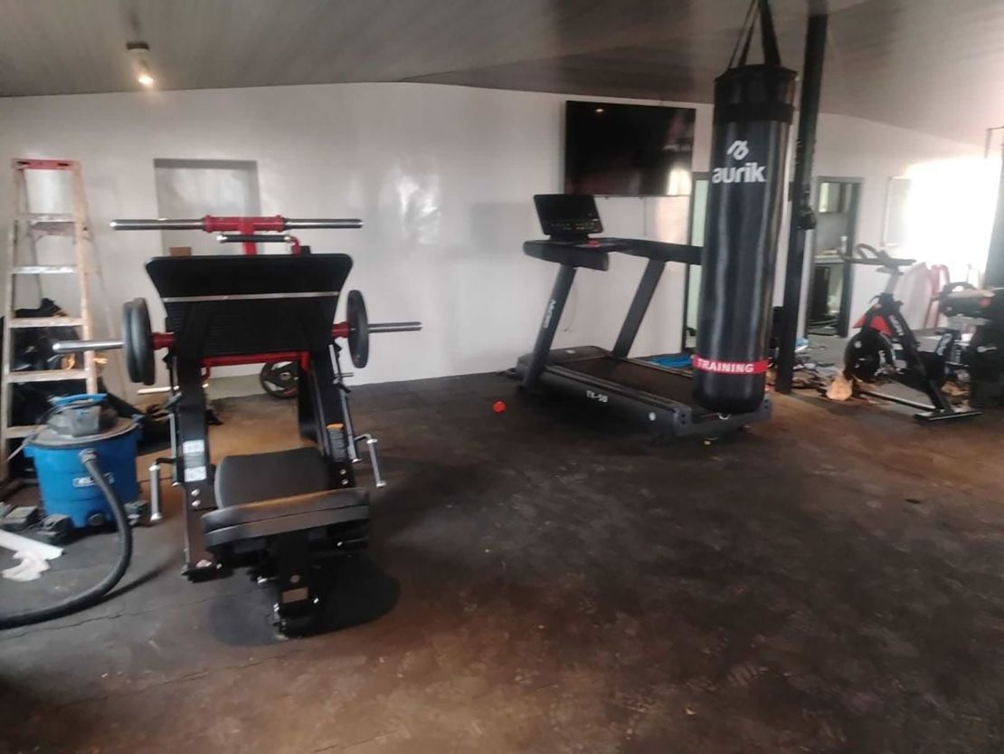 The house was fully equipped and featured a pool, a gym, appliances, a game room, marble-like walls, and other features that indicated the property was still under construction.