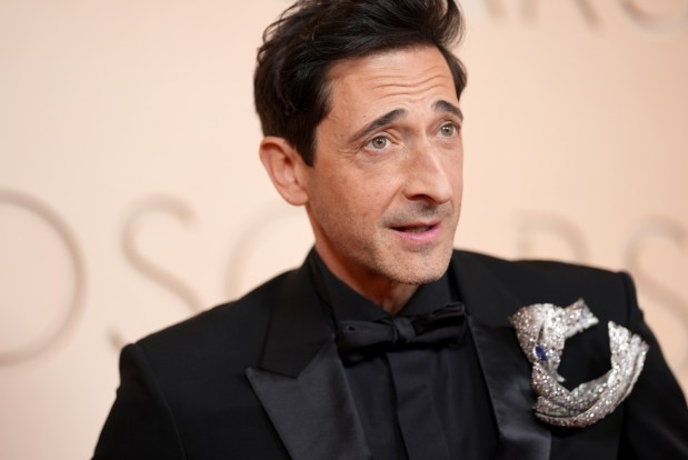 Adrien Brody arrives at the Oscars on March 15, 2026, at the Dolby Theatre in Los Angeles. He plays Nick Yarris in the the play, the