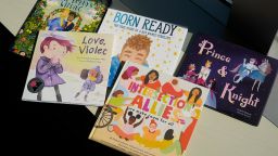 A selection of books featuring LGBTQ characters that are part of a Supreme Court case are pictured, Tuesday, April, 15, 2025, in Washington, DC.