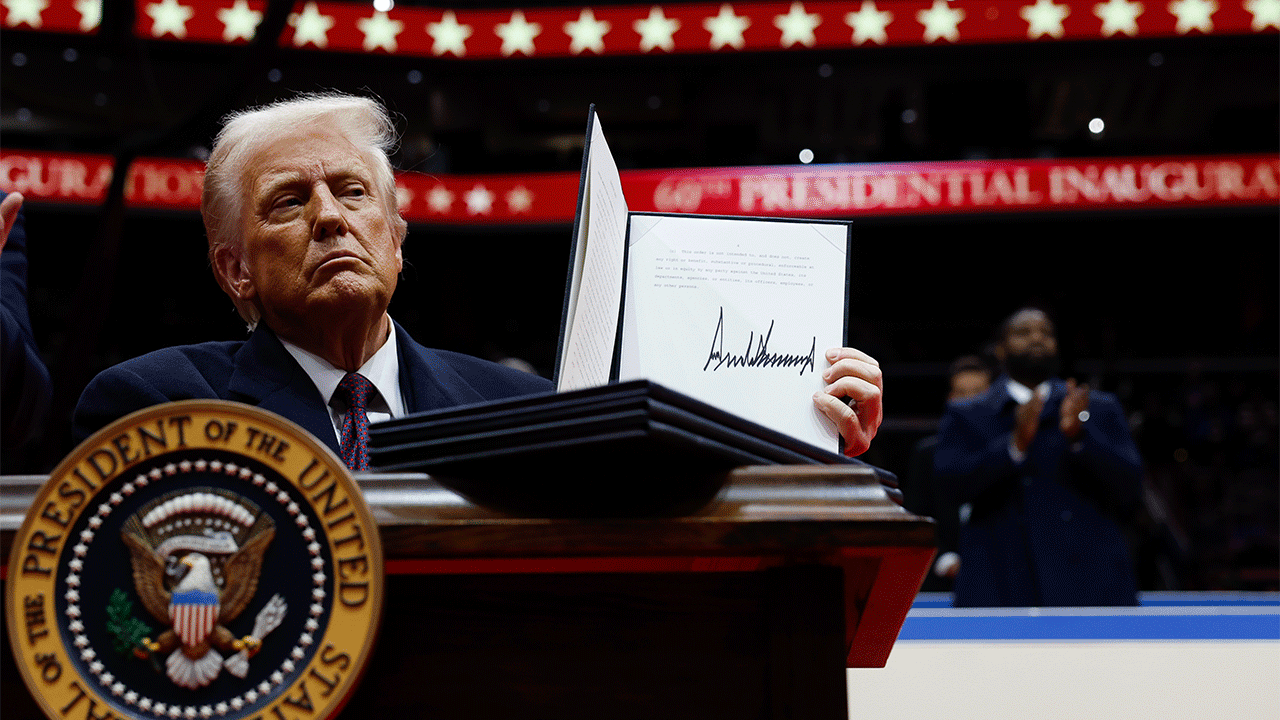 President Donald Trump signs executive orders on Inauguration Day.