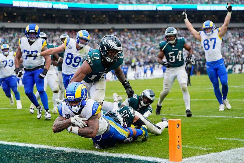 FILE - Los Angeles Rams running back Kyren Williams (23) scores a touchdown during the second half of an NFL football game against the Philadelphia Eagles in Philadelphia, Sunday, Oct. 4, 2026. (AP Photo/Chris Szagola, File)