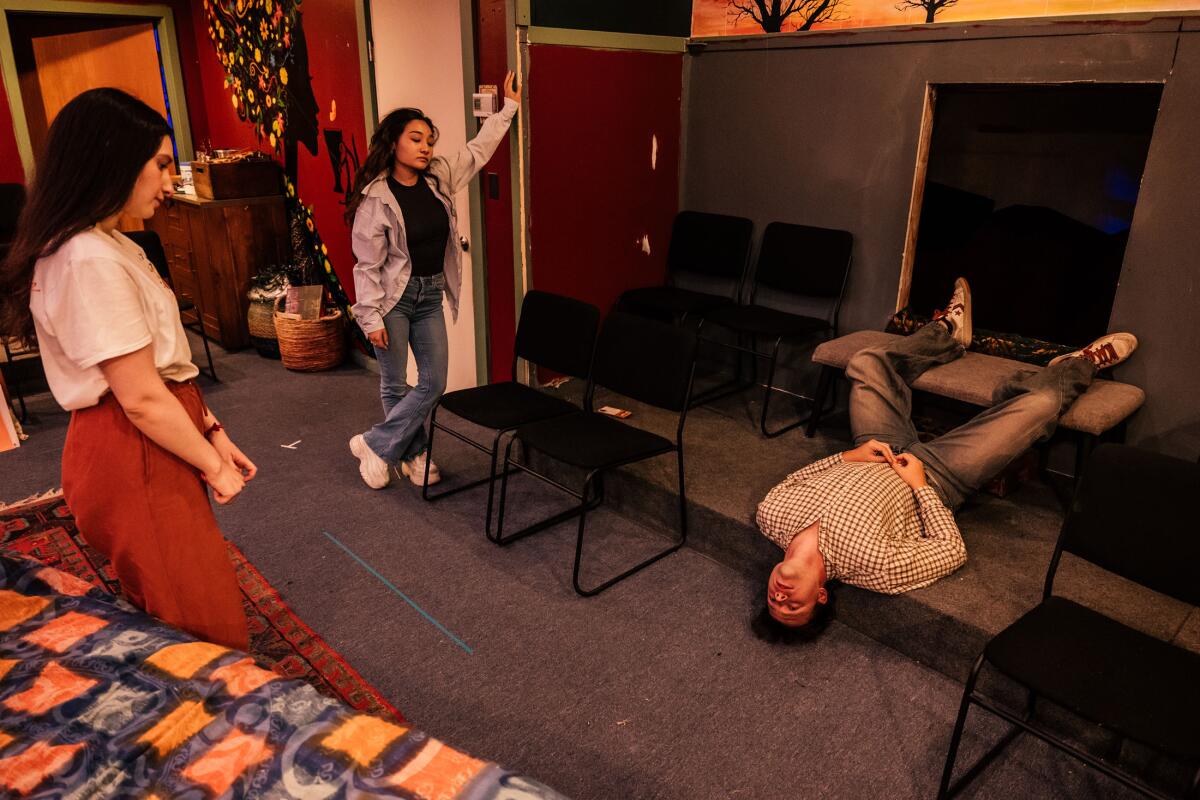 Carolina Rodriguez, left, Alexandra Lee and Michael Guarasci in the play "Adolescent Salvation."