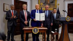 National Institutes of Health Director Jay Bhattacharya, Administrator for the Centers for Medicare & Medicaid Services Mehmet Oz, President Donald Trump, Health and Human Services Secretary Robert F. Kennedy Jr., and Food and Drug Administration Commissioner Martin Makary stand together after Trump signed an executive order aimed at reducing the cost of prescription drugs and pharmaceuticals by 30% to 80% during an event in the Roosevelt Room of the White House on May 12 in Washington, DC. 