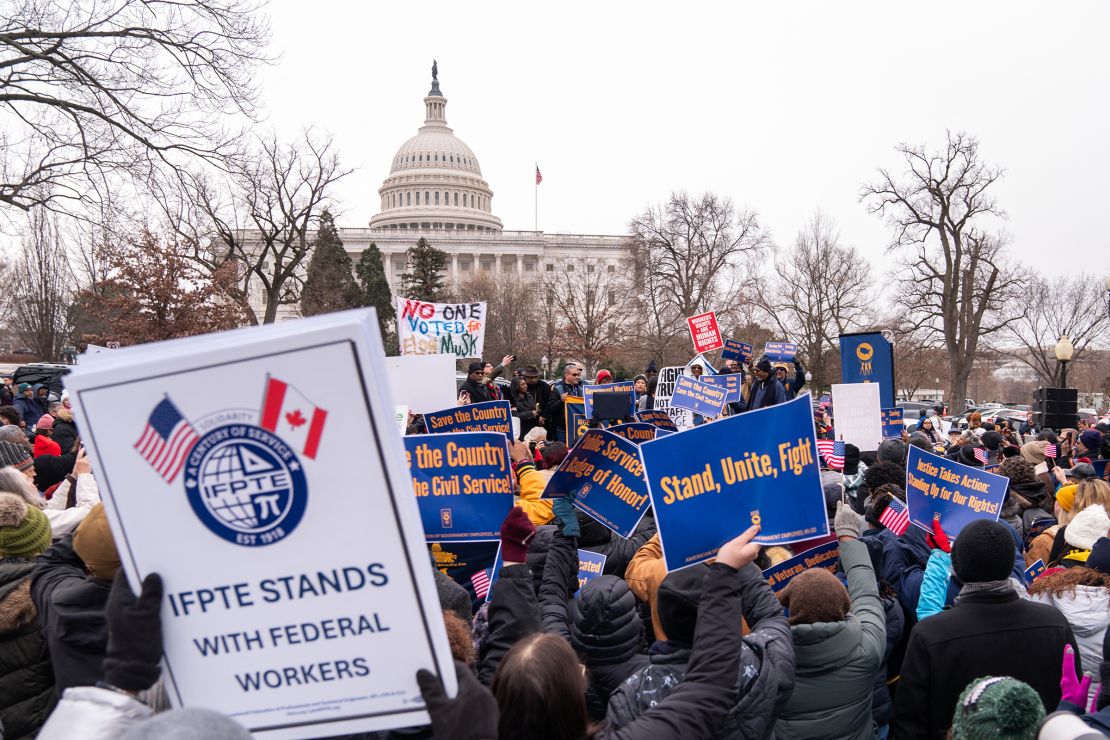 Protesters gather at a rally organized by the American Federation of Government Employees against the so-called Department of Government Efficiency (DOGE) purges and resignation offers made to the federal civilian workforce outside the US Capitol in Washington, DC, on February 11.