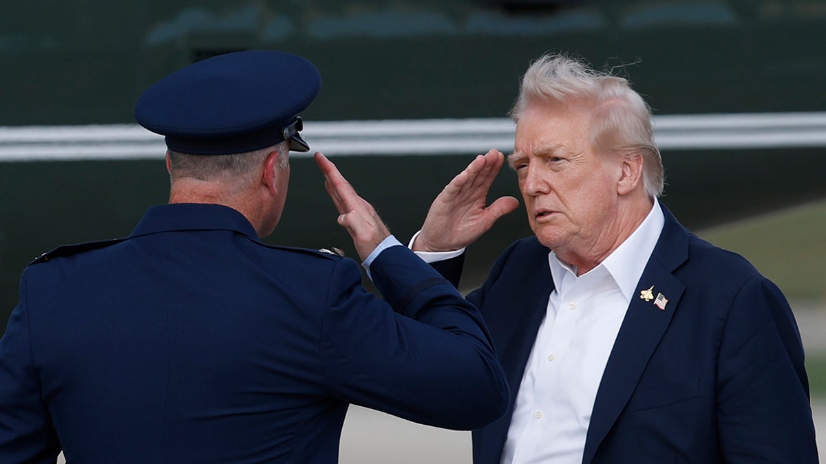 Trump saluting