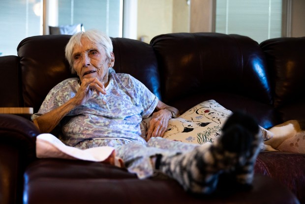 Iris Morgan, 89, relaxes on the couch at home in Virginia Beach on Monday, August 31, 2026. Morgan was in hospice care for two years and died on Sept. 5, 2026. (Kendall Warner/The Virginian-Pilot)